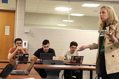 Teacher teaching and students watching
