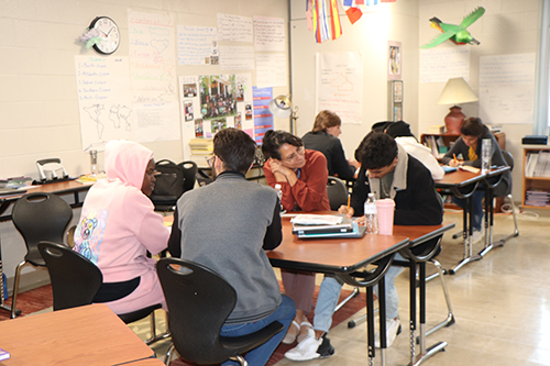 Students sitting around their desks