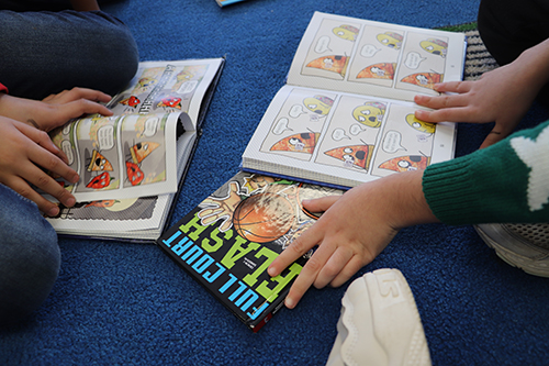 hands holding books